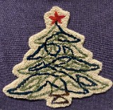 Christmas Tree, Hooked by Betsy Warner in yarn, pattern by P is for Primitive