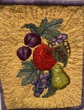 Mary Gamarello. Mat with fruit started by Alma Coia and finished by Mary