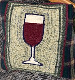 Wine Glass Pillow.Designed and Hooked by Sarah Gerding (2022)